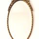 Bronze mirror in Hollywood Regency style from the 1940s/50s.