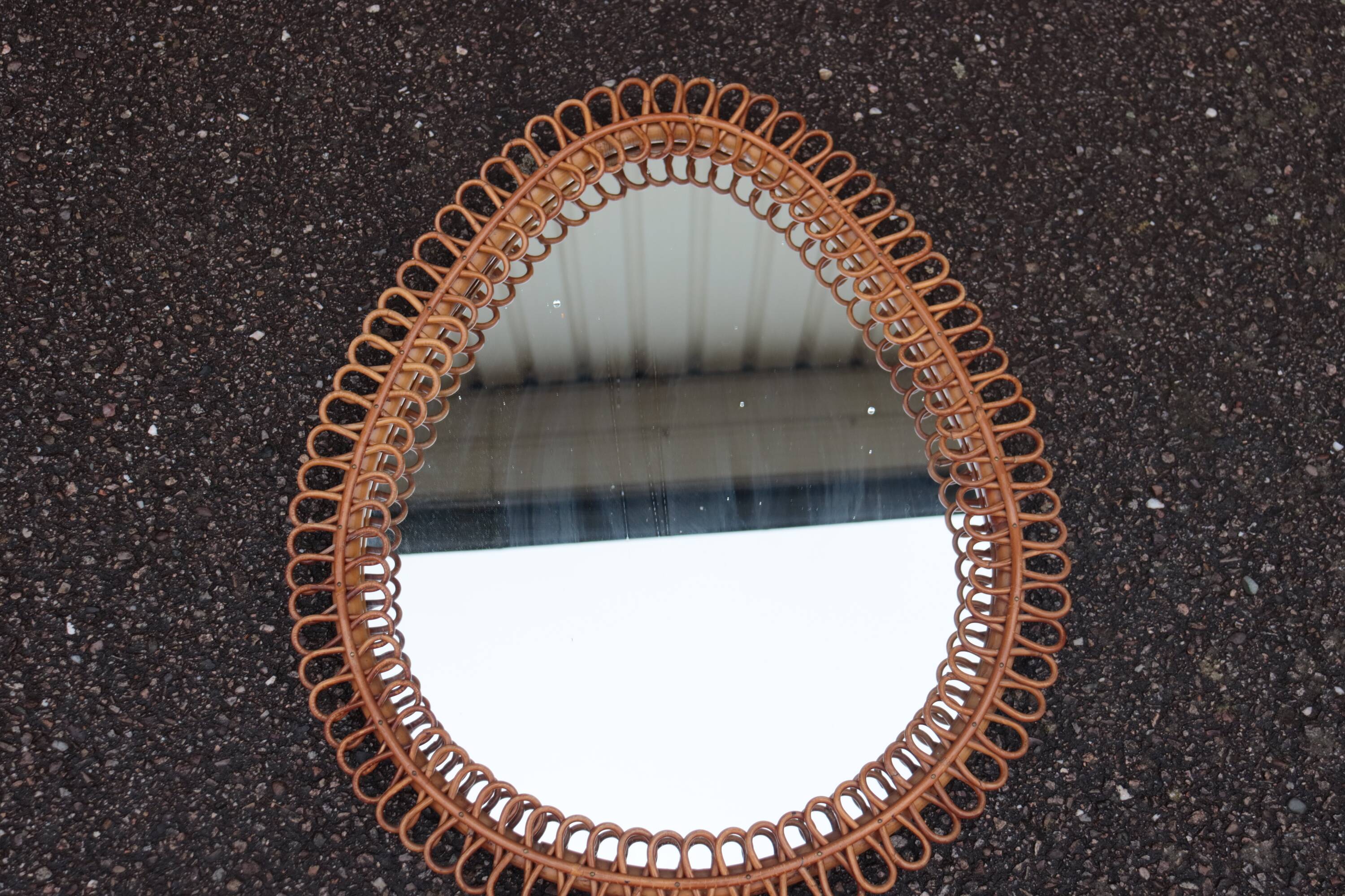Large rattan mirror attributed to Franco Albini, Italy 1960.