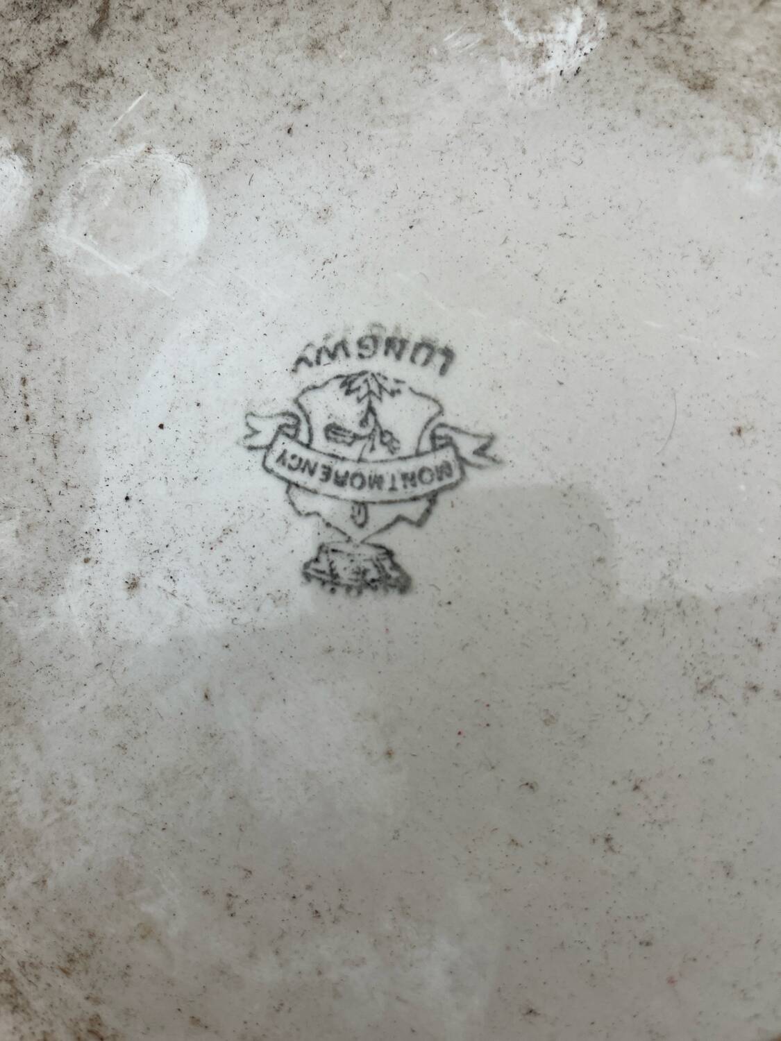 Antique Longwy-Montmorency earthenware trivet