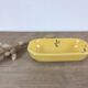 Yellow ceramic butter maker