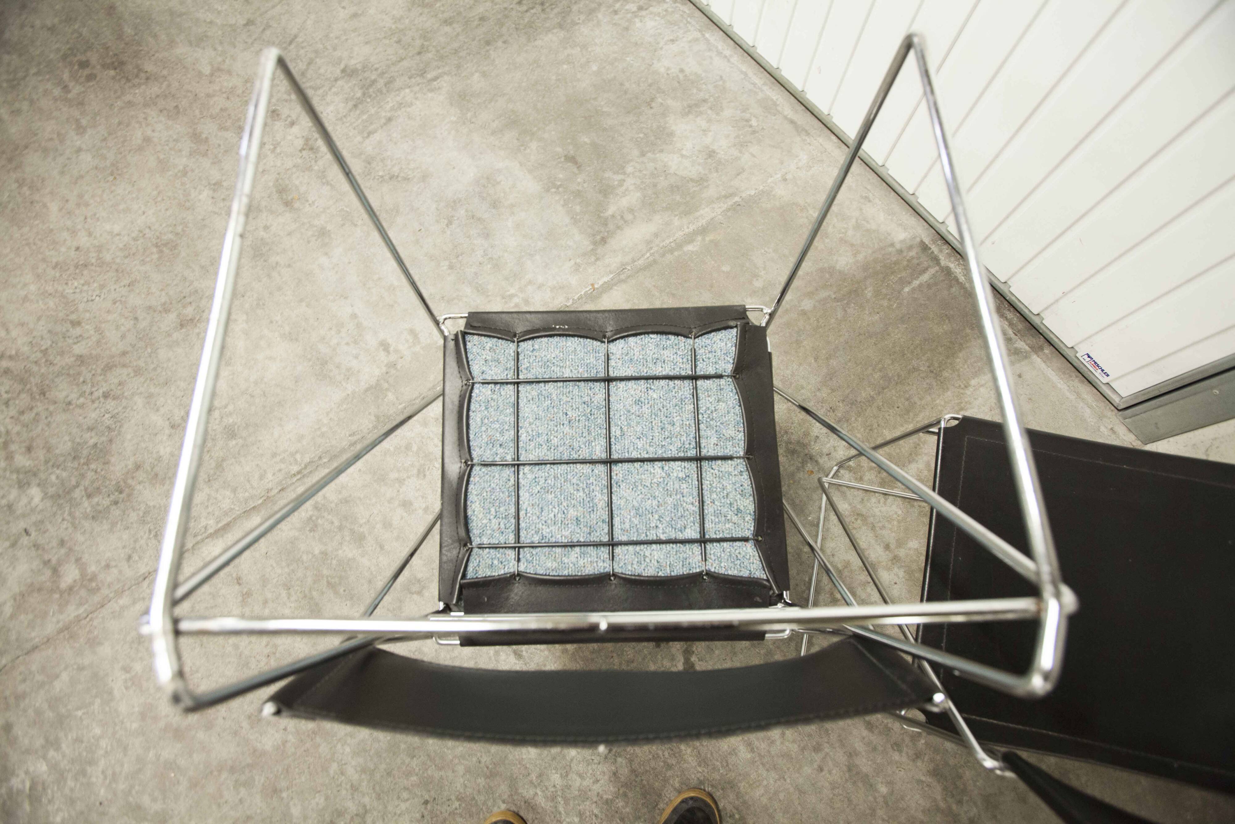 Set of 3 minimalist X line chairs by Niels Jorgen Haugesen.