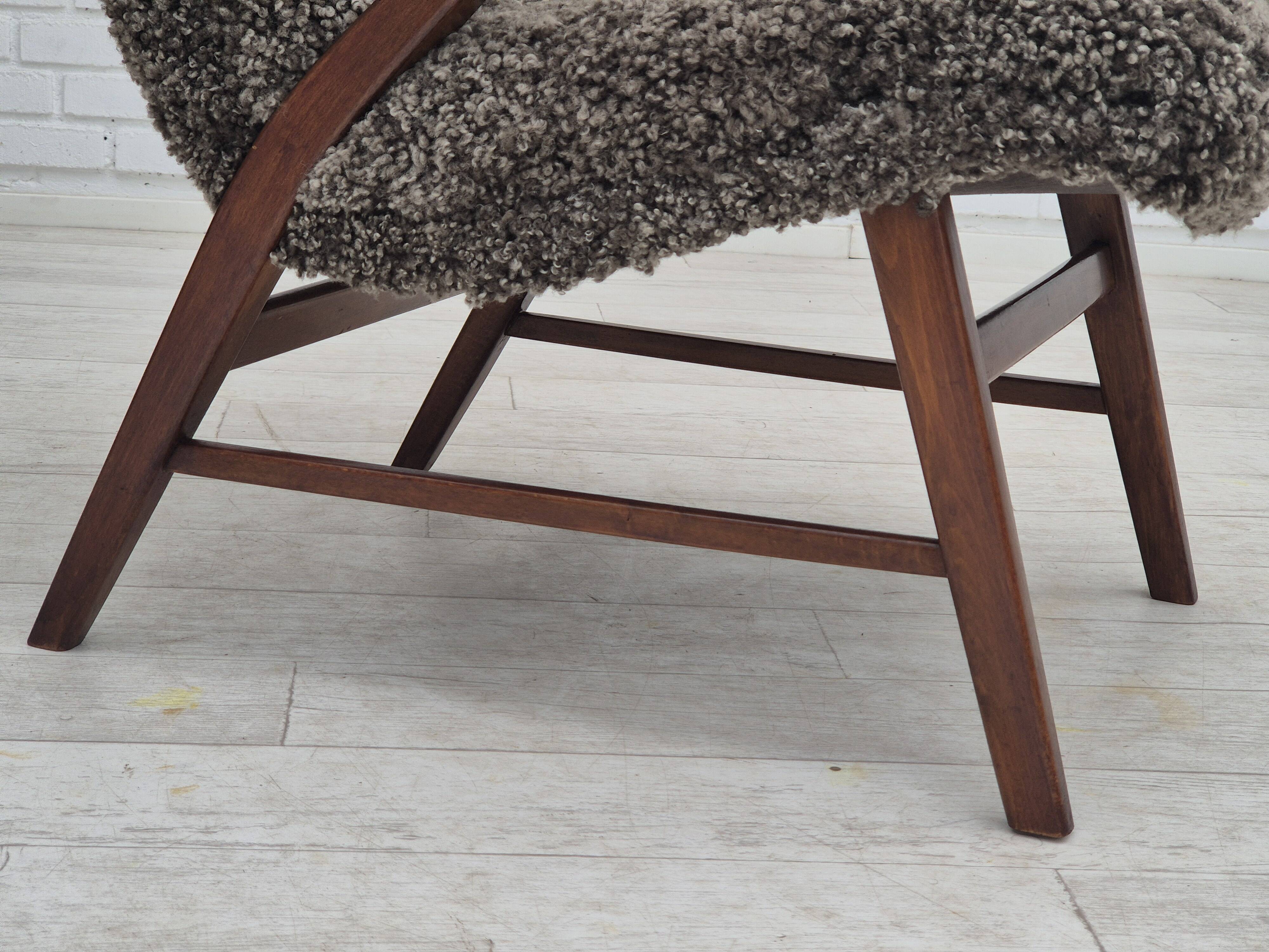 60s, Danish design, refurbished armchair, genuine sheepskin "Wellington".
