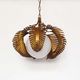 Gilt palm leaf and opaline glass pendant light by Hans Kögl