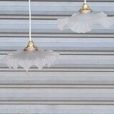 Pair of polished glass pendant lights