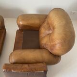 Pair of brown leather armchairs