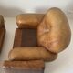 Pair of brown leather armchairs
