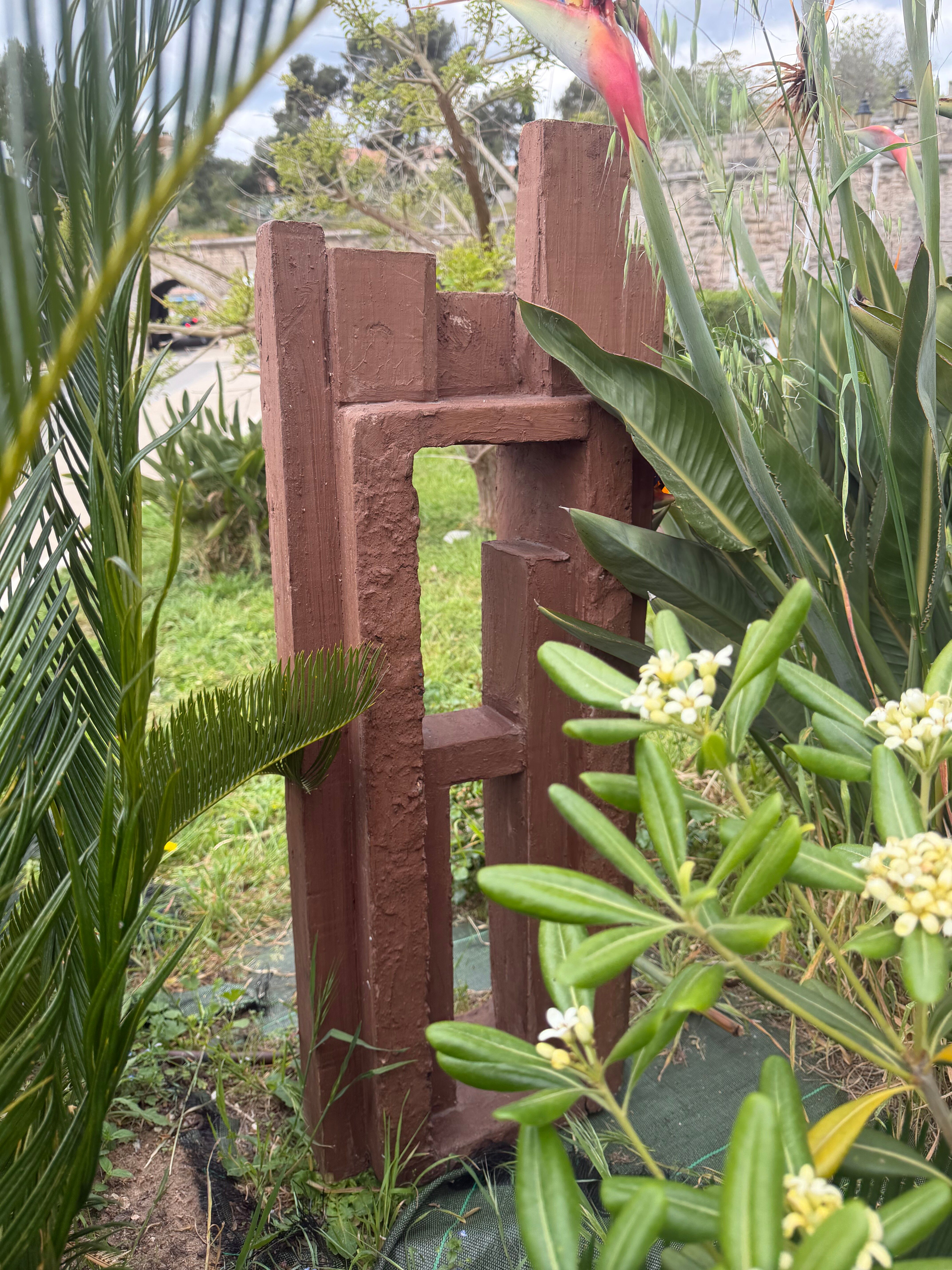Superb postmodern brutalist sculpture in wood, metal, and material.