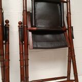 Pair of vintage "safari" folding armchairs in mahogany and leather