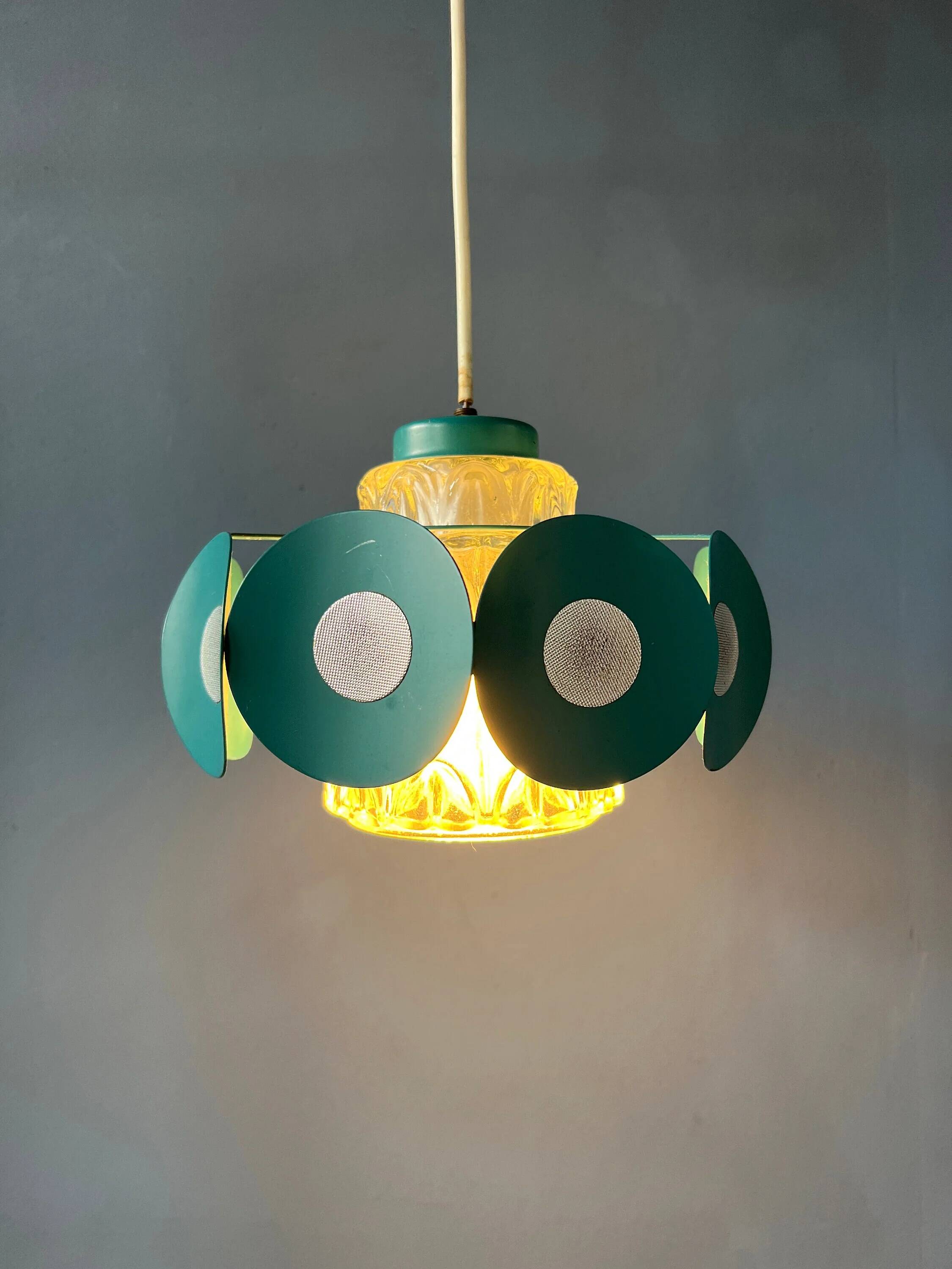 Suspension Space Age with glass shade and green/blue metal structure.