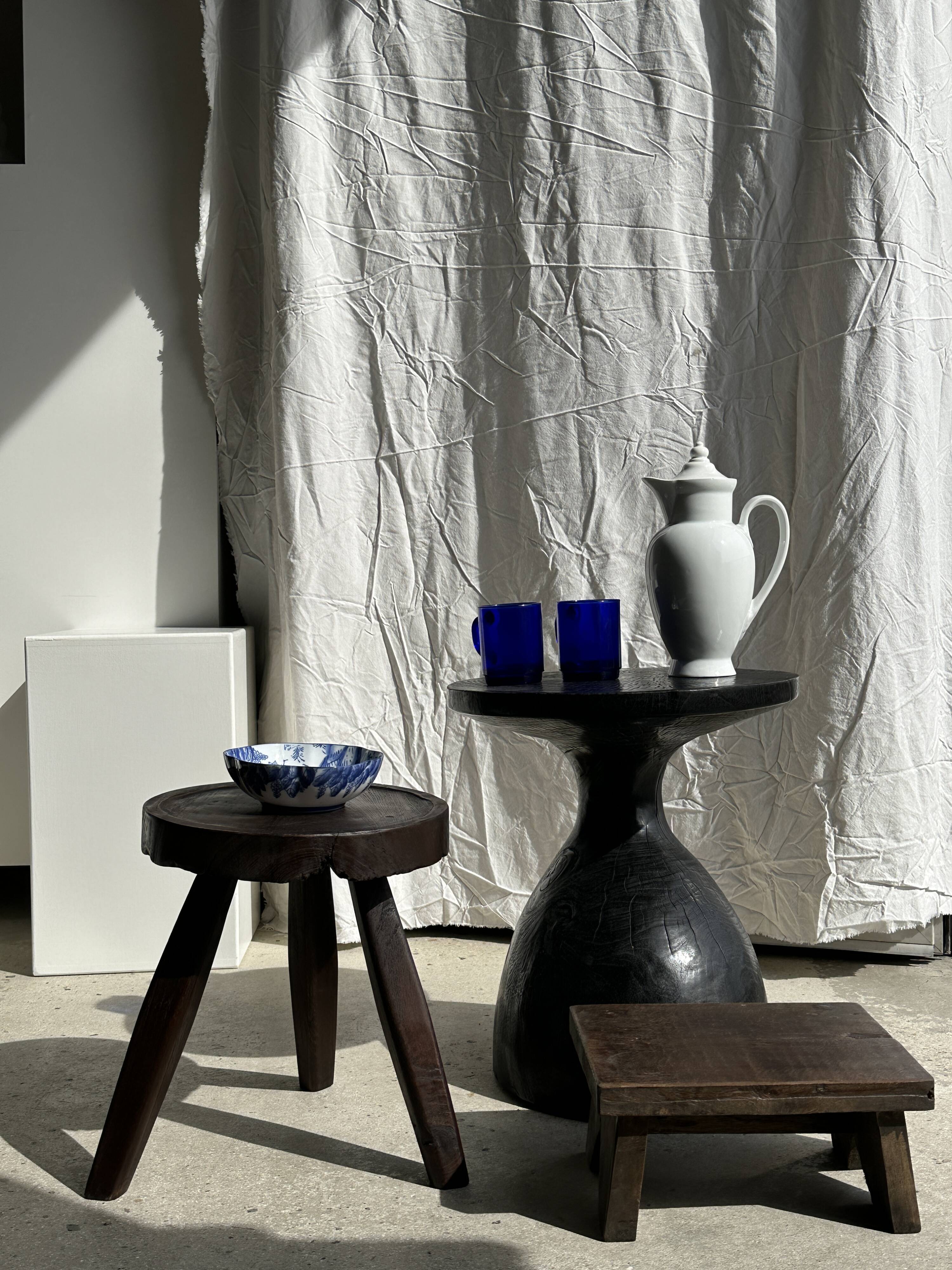 Solid wood (monoxyl) side table, organic shape, black color