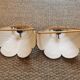 Pair of vintage "tulip" wall lights in rattan and canework