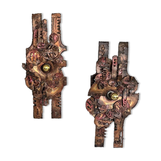 Set of raw expressive wall sconces by Francesco Pasinato