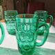 Suite of 4 vintage mugs in green glass