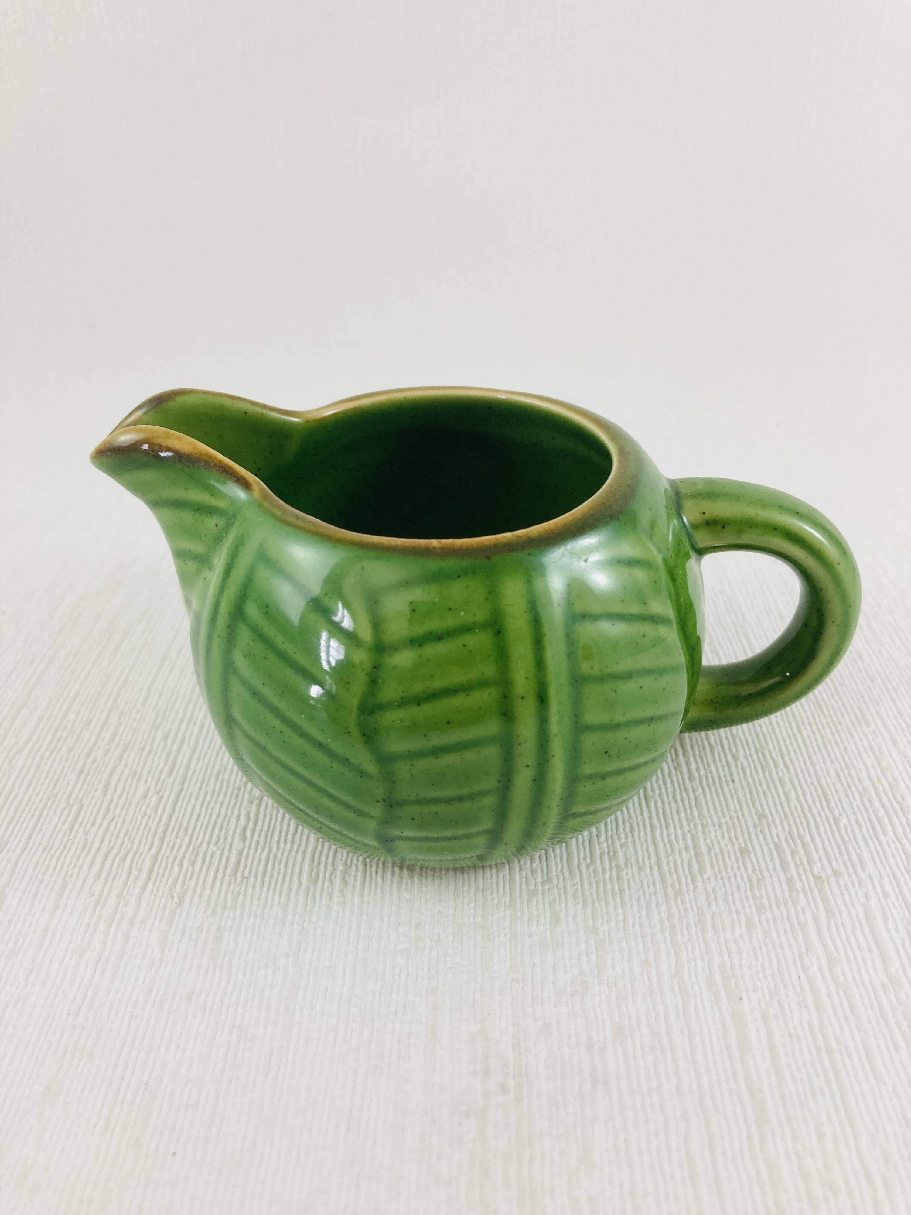 Green earthenware tea set with cabbage pattern, vintage 1970s.