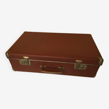 Old suitcase travel trunk with keys