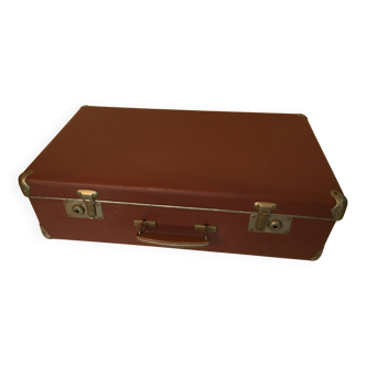 Old suitcase travel trunk with keys