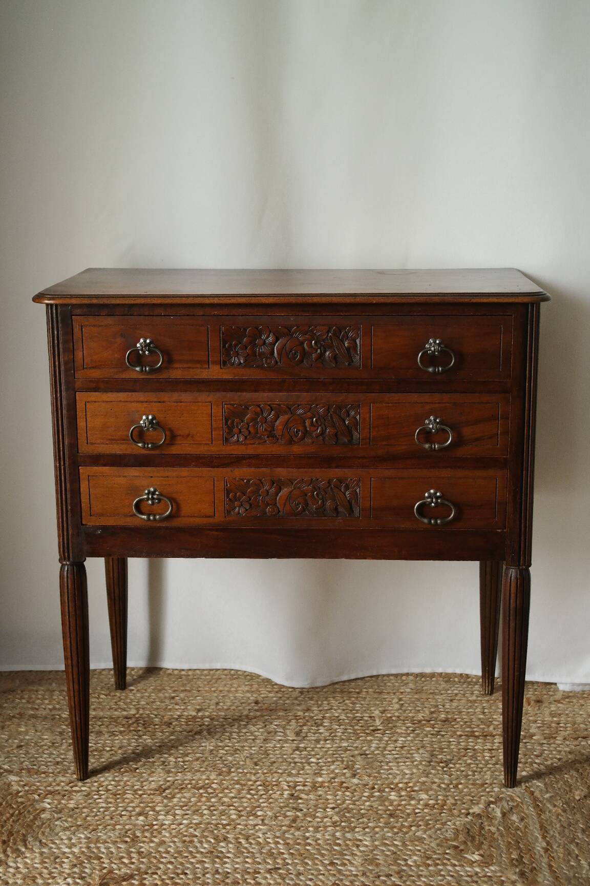 Solid walnut chest of drawers from the early 20th century.