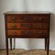 Solid walnut chest of drawers from the early 20th century.