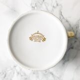 Set of 7  cups in white and gold porcelain