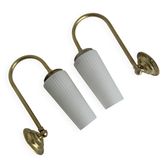 A pair of vintage opaline and brass wall lights