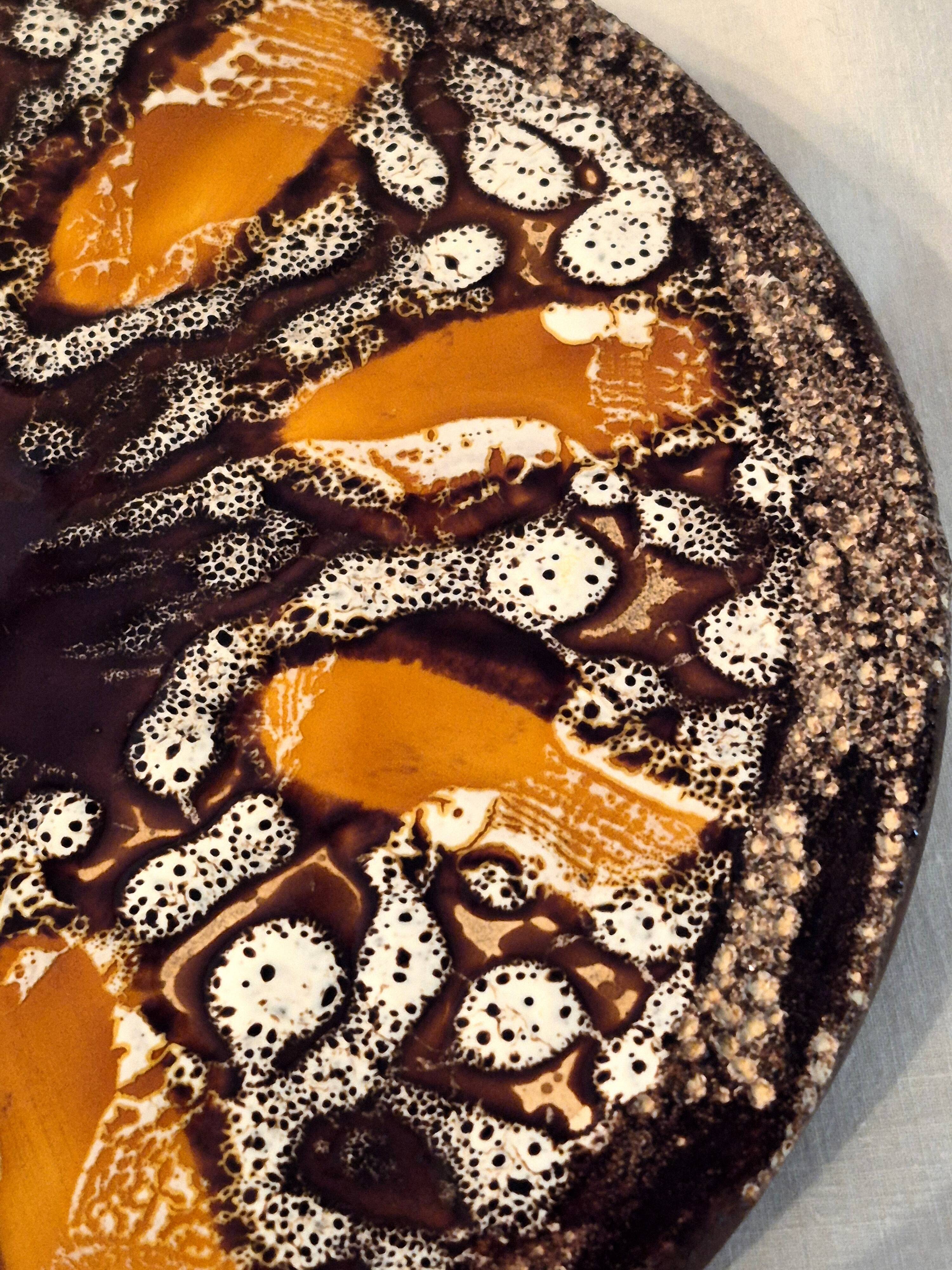 Round plate Vallauris glazed ceramic in brown and orange and Fat Lava A036