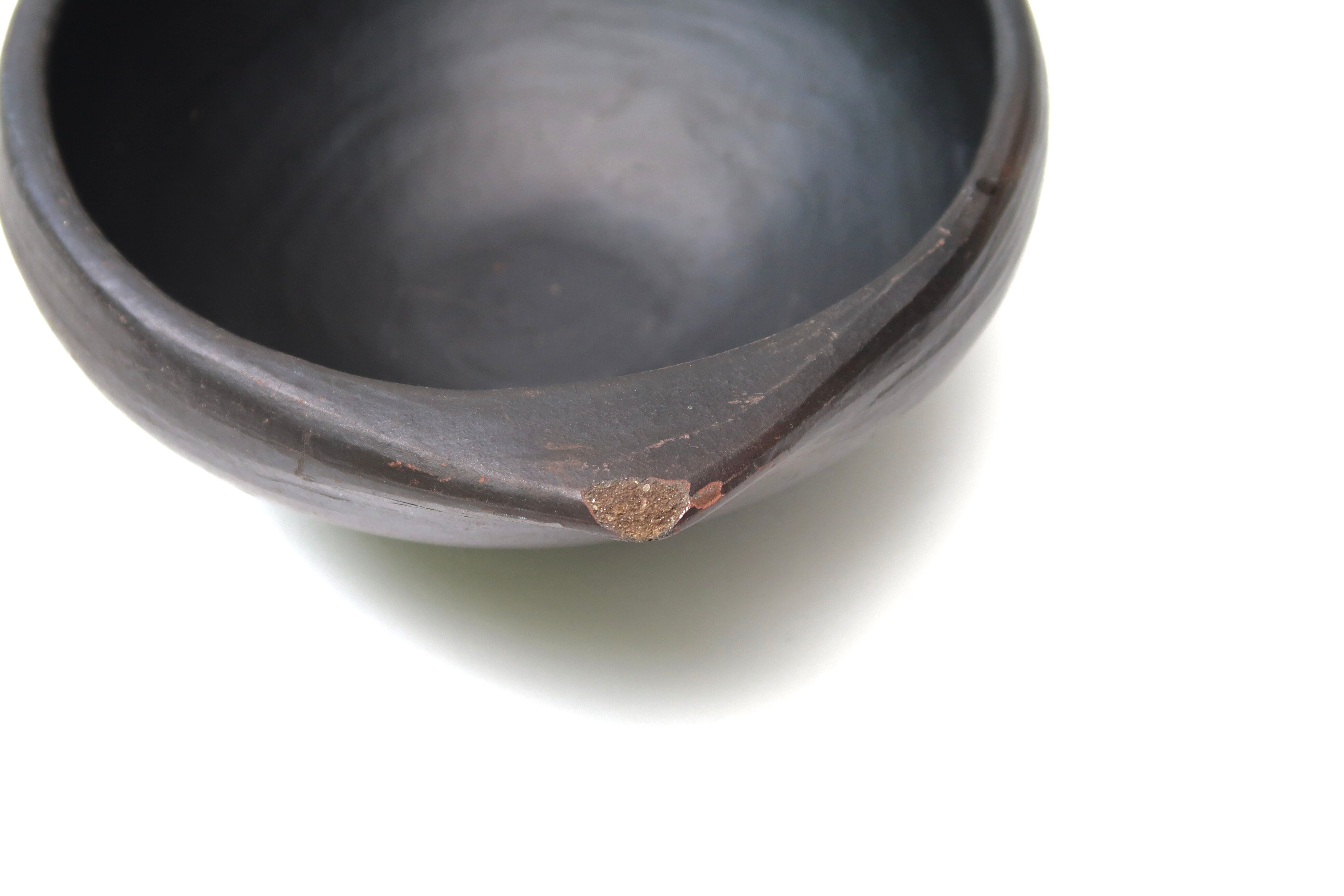 Empty colombian chamba black ceramic pocket, 70s