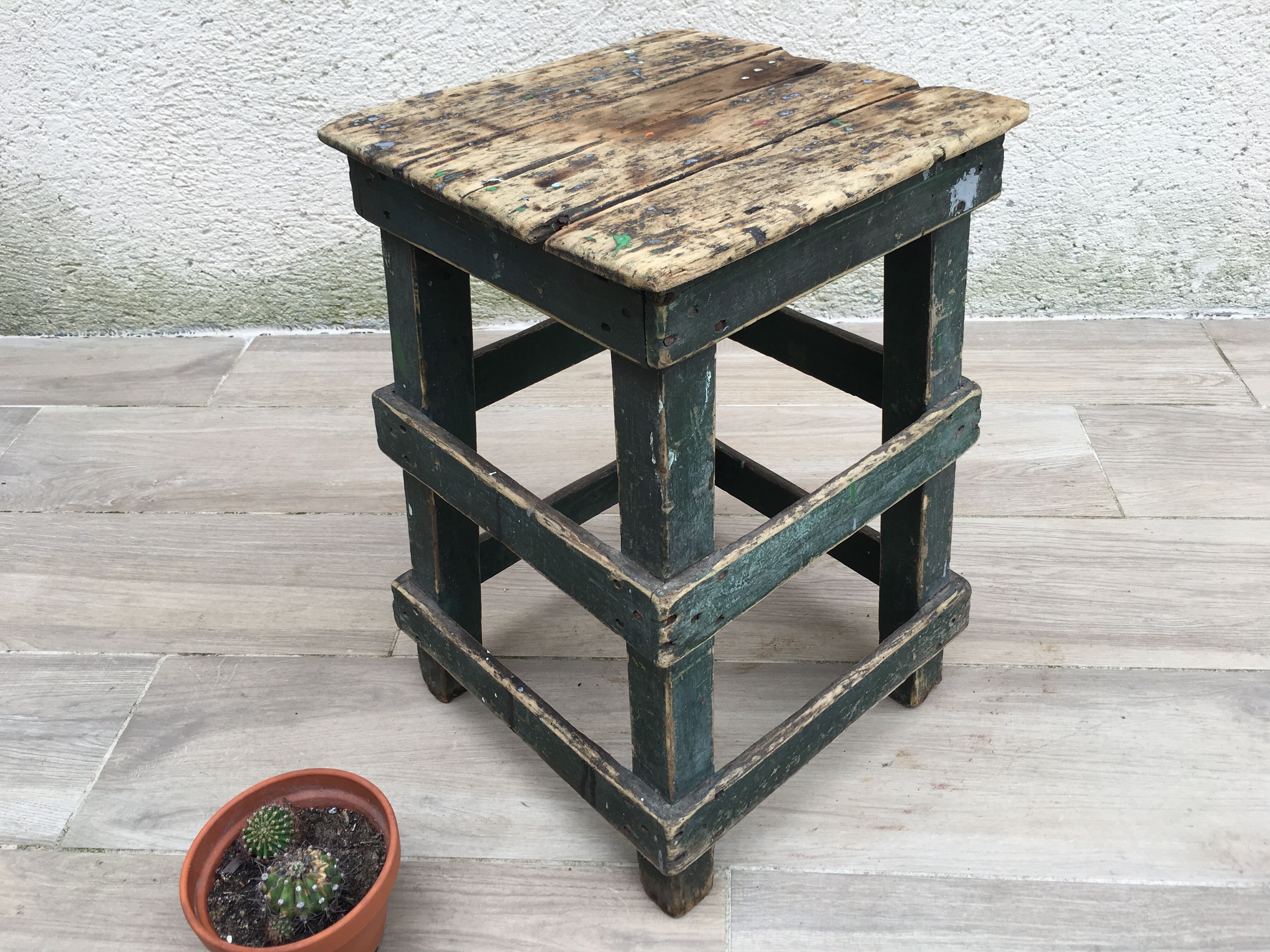 Former green workshop stool