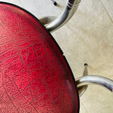 Pair of raspberry-colored chairs from the 60s/70s with metal legs