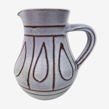 Vintage pitcher in enamelled earth