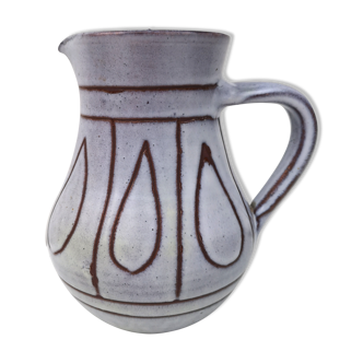 Vintage pitcher in enamelled earth