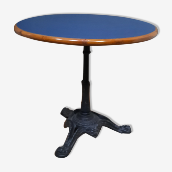 Table bistrot plateau rond en bois recouvert de plastique