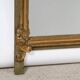 Antique flowered mirror from the 19th century.