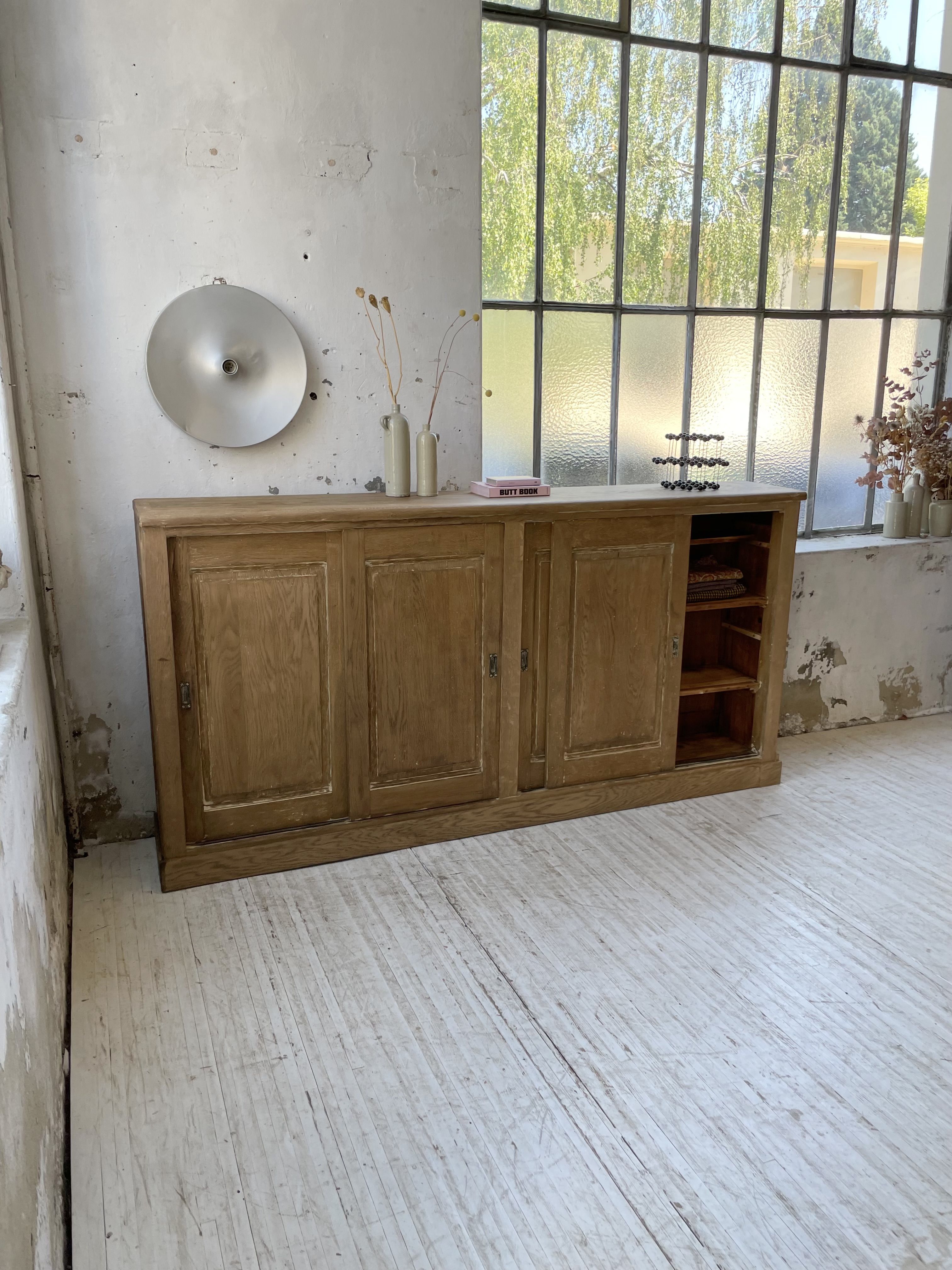 Large row of solid oak loom sliding doors