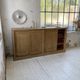 Large row of solid oak loom sliding doors