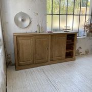 Large row of solid oak loom sliding doors