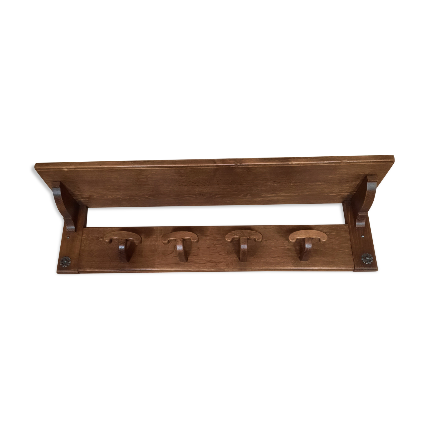 Wearing a brutalist style wooden wall coat