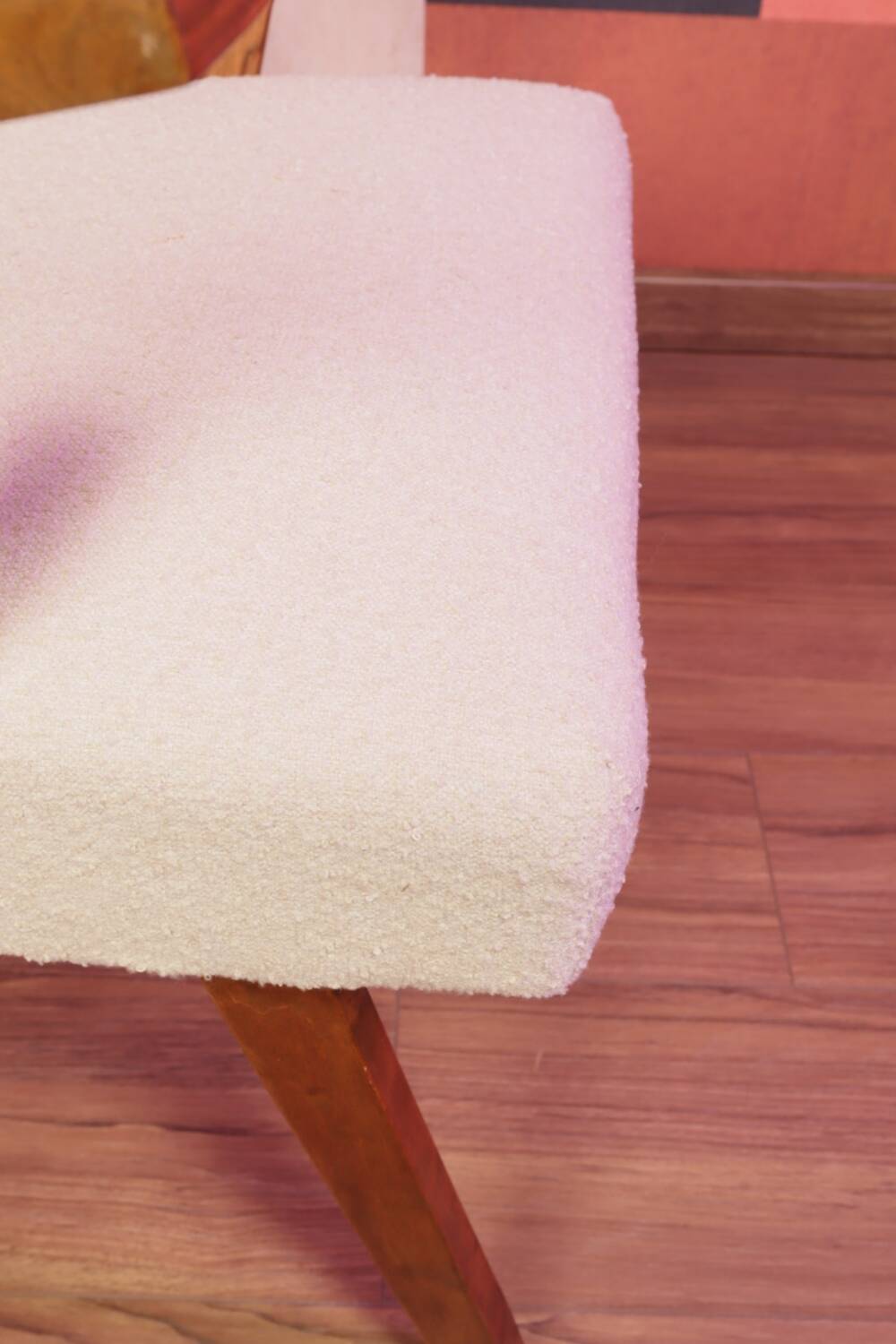 Vintage beige bouclé armchair with walnut wood from the 1950s.