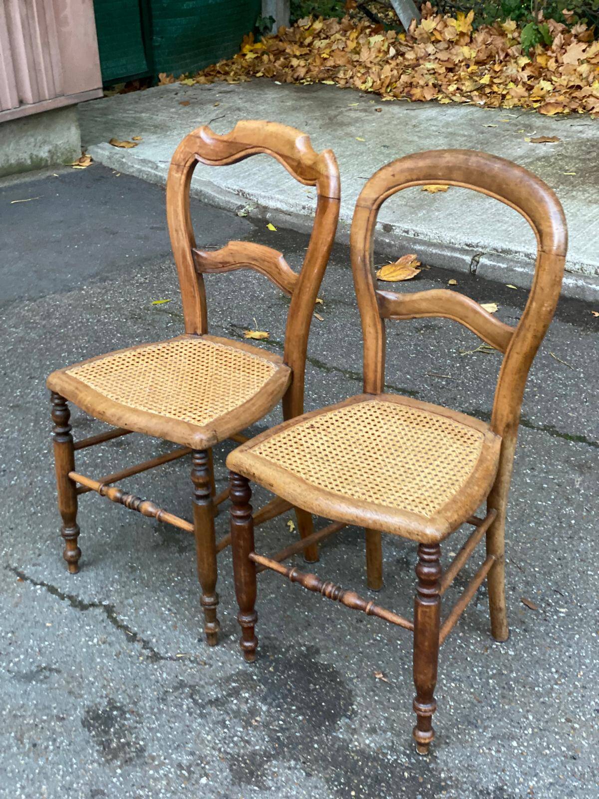 Two Louis Philippe cane chairs in solid carved wood from the 20th century