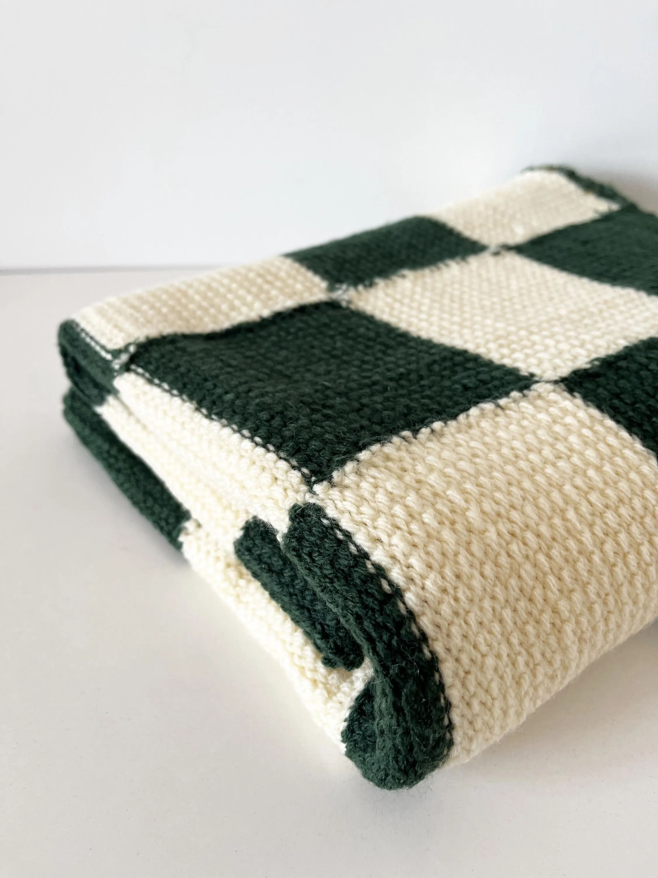 Handmade knitted wool vichy blanket