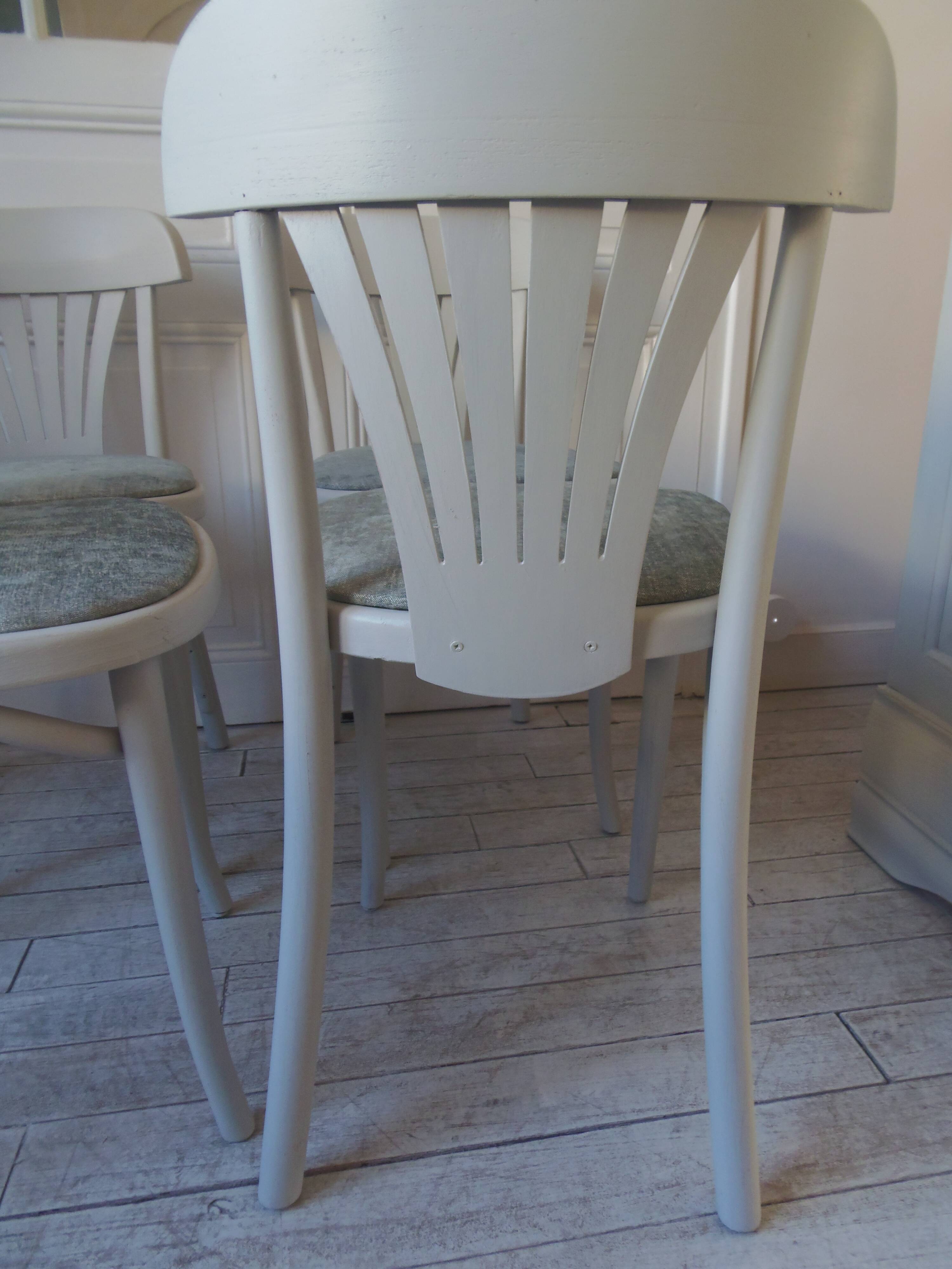 Set of 4 vintage bistro chairs enhanced in pearl grey.