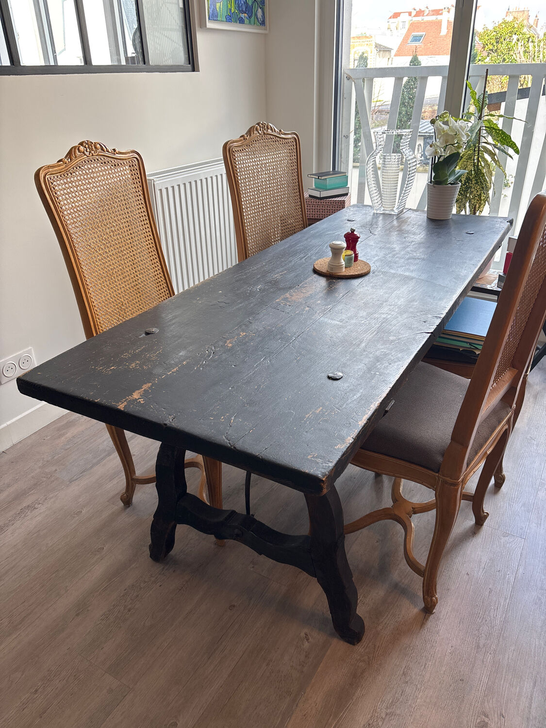 Solid wood farmhouse table with ebony finish.