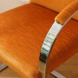 Chrome-plated metal and orange fabric armchair, 1970