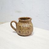 Vintage pitcher in pyrite sandstone