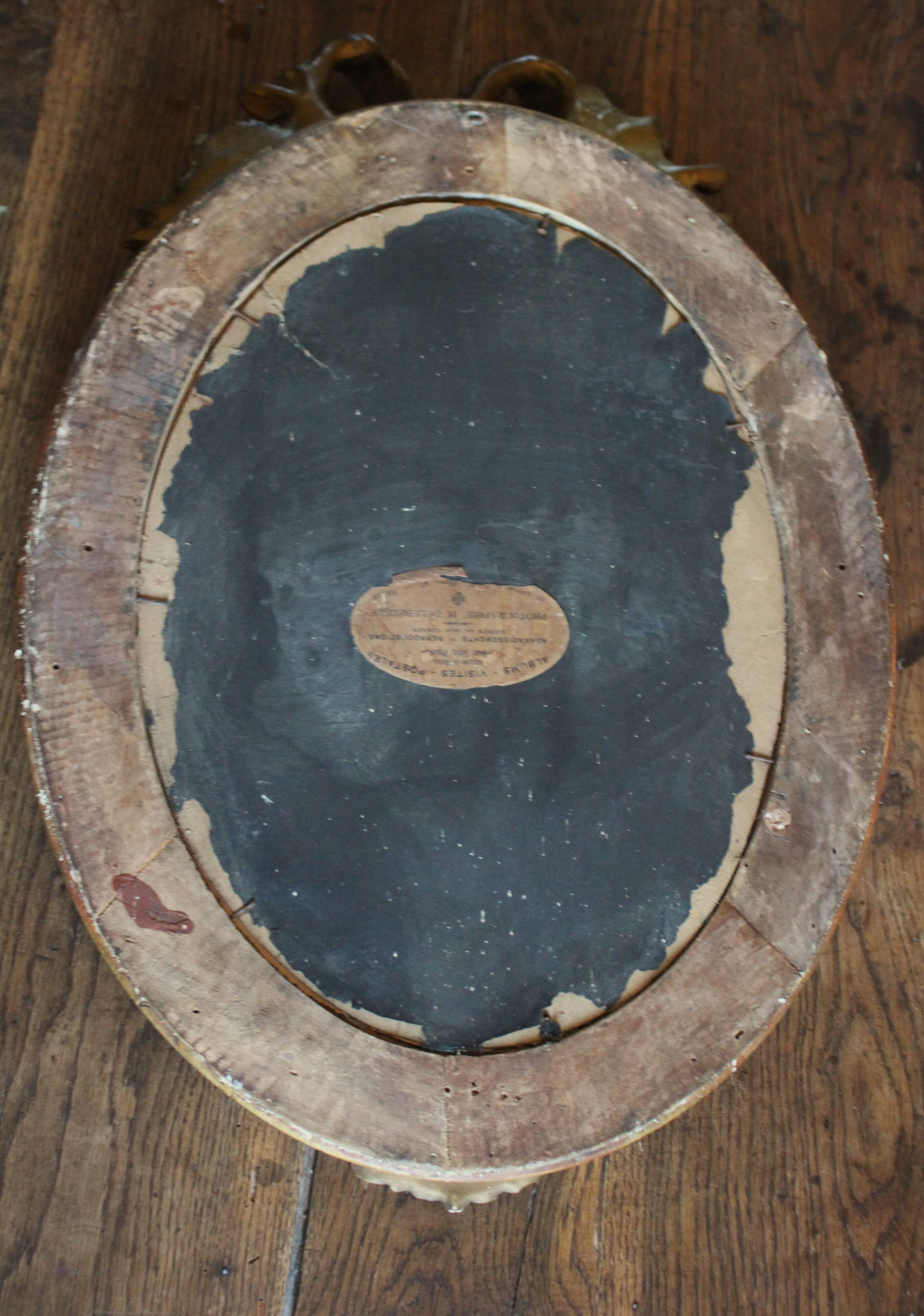 Golden Oval Mirror with Bow and Roses Decor