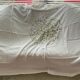 Hand-embroidered tablecloth on rectangular thread canvas