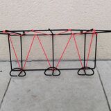 Vintage metal coat rack and wall-mounted scoubidou