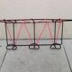 Vintage metal coat rack and wall-mounted scoubidou