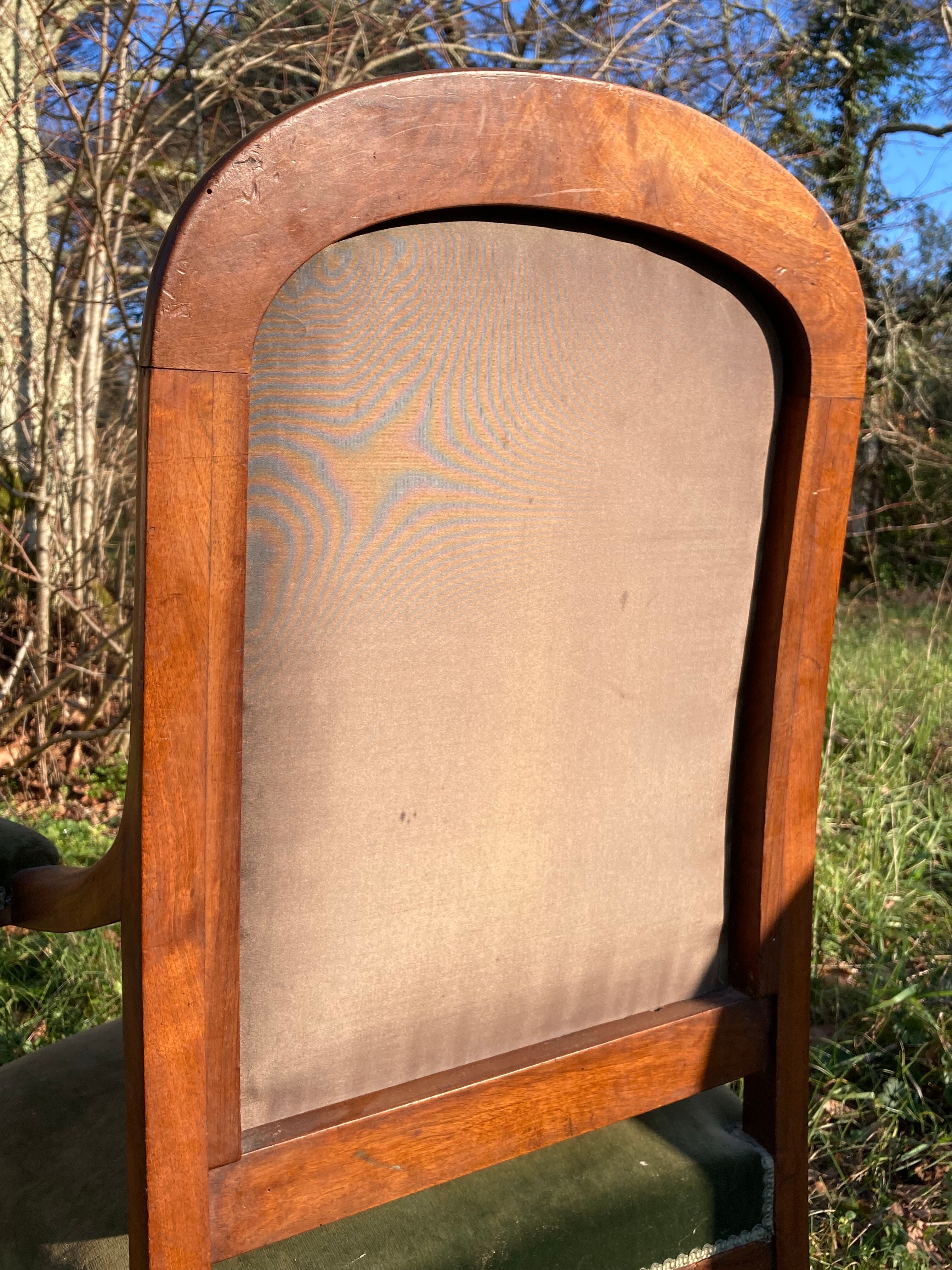 Antique Voltaire armchair in wood and green velvet Louis Philippe