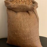 Lampe sac toile de jute avec grains de blé de Didier Goudot, 1980