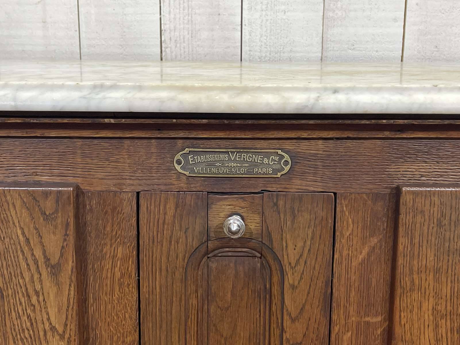 Glacière début XXème en chêne et dessus marbre
